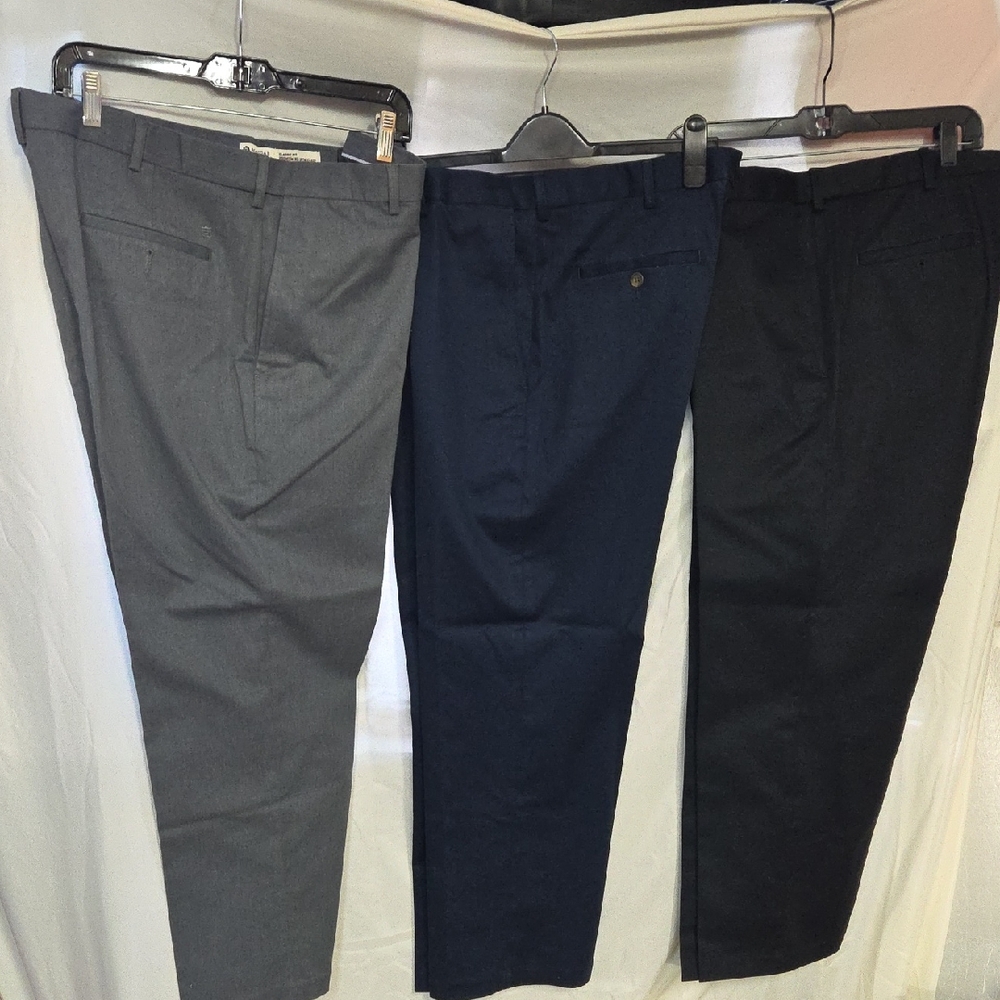 3 Pair Haggar dress pants. Available in charcoal, navy, and black. 36x29